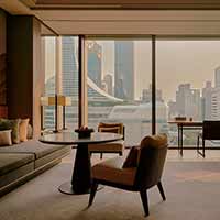 What accounts for Aman’s exalted position in the hotel world?