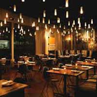 Why do restaurant owners persist with such dim light?